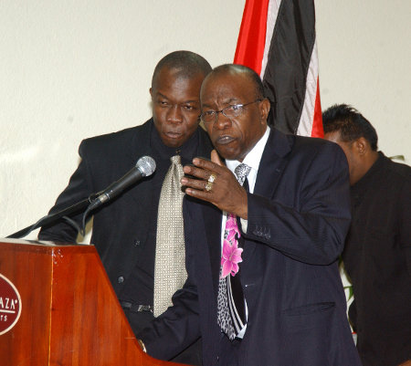Photo: Jack Warner (right) and his son Daryan perform a duet, seven years ago, when they attacked then Trinidad Express journalist Lasana Liburd over his scoop on the Simpaul Travel World Cup ticket scandal.