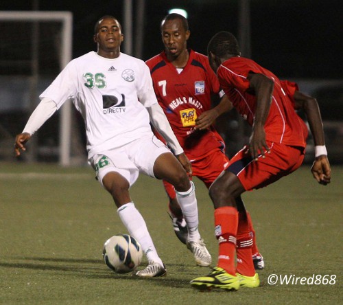 Photo: W Connection attacker Joevin Jones (left) during Pro League action against Caledonia AIA last season. (Courtesy Wired868)