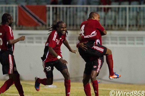 Photo: The Trinidad and Tobago national football team celebrates booking its place at the 2013 CONCACAF Gold Cup. Who's the loser now, Creed? (Courtesy Allan V Crane/Wired868)