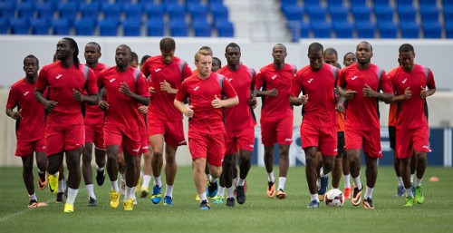 Photo: The Trinidad and Tobago senior national football team warms up at the 2013 CONCACAF Gold Cup. (Courtesy CONCACAF)